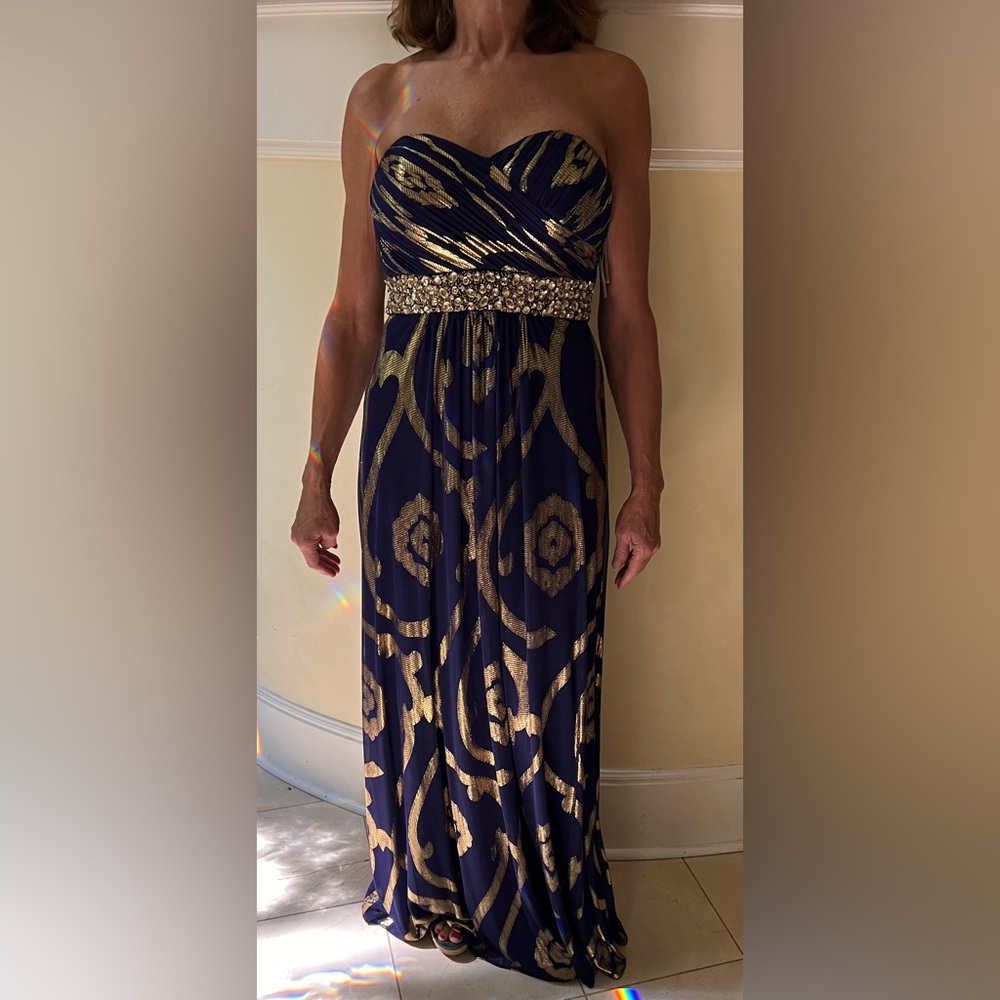 Betsy & Adam NWT strapless navy evening gown with gold woven design. Size 6.